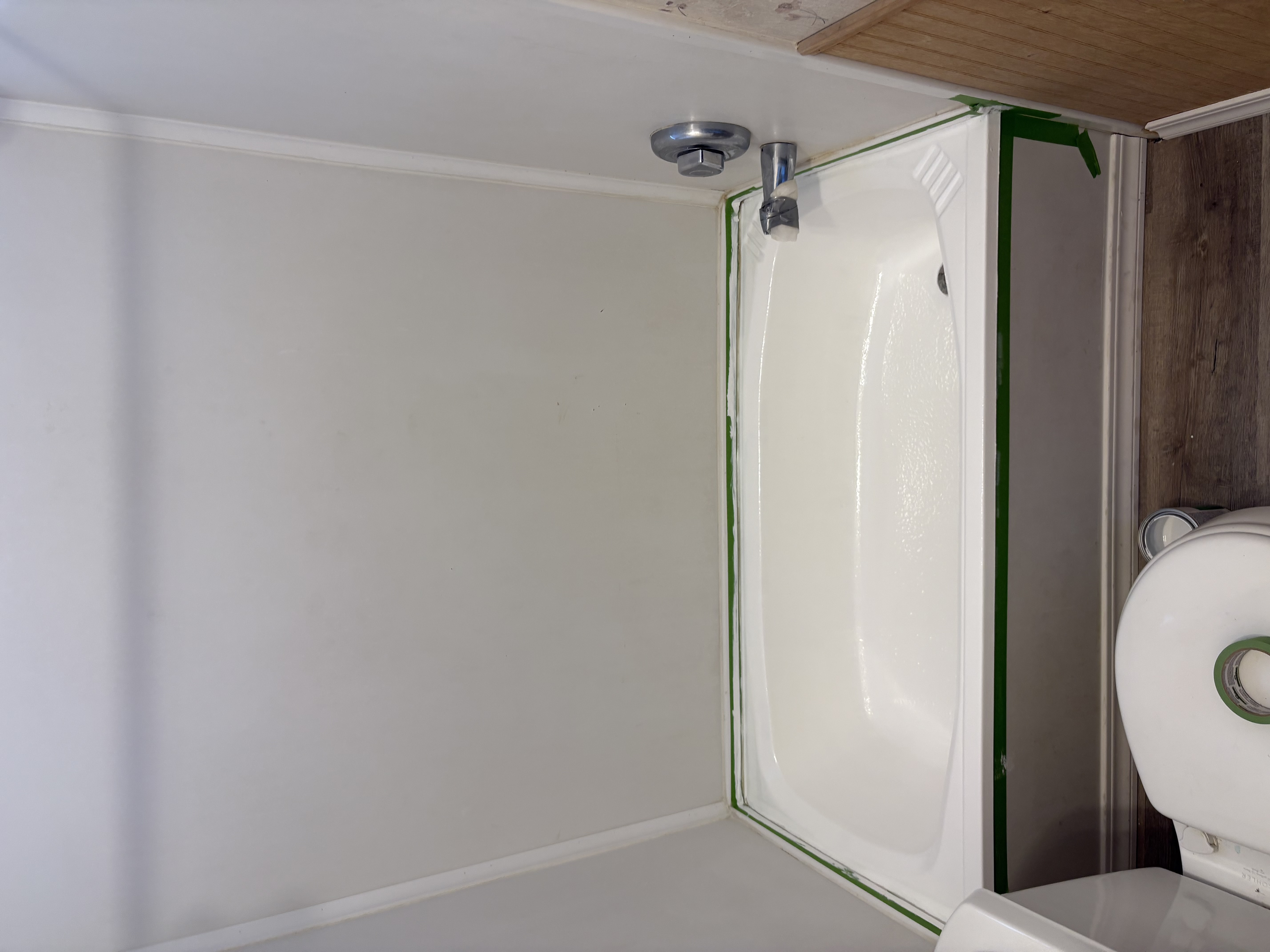Tub surround install – taped and ready for caulk