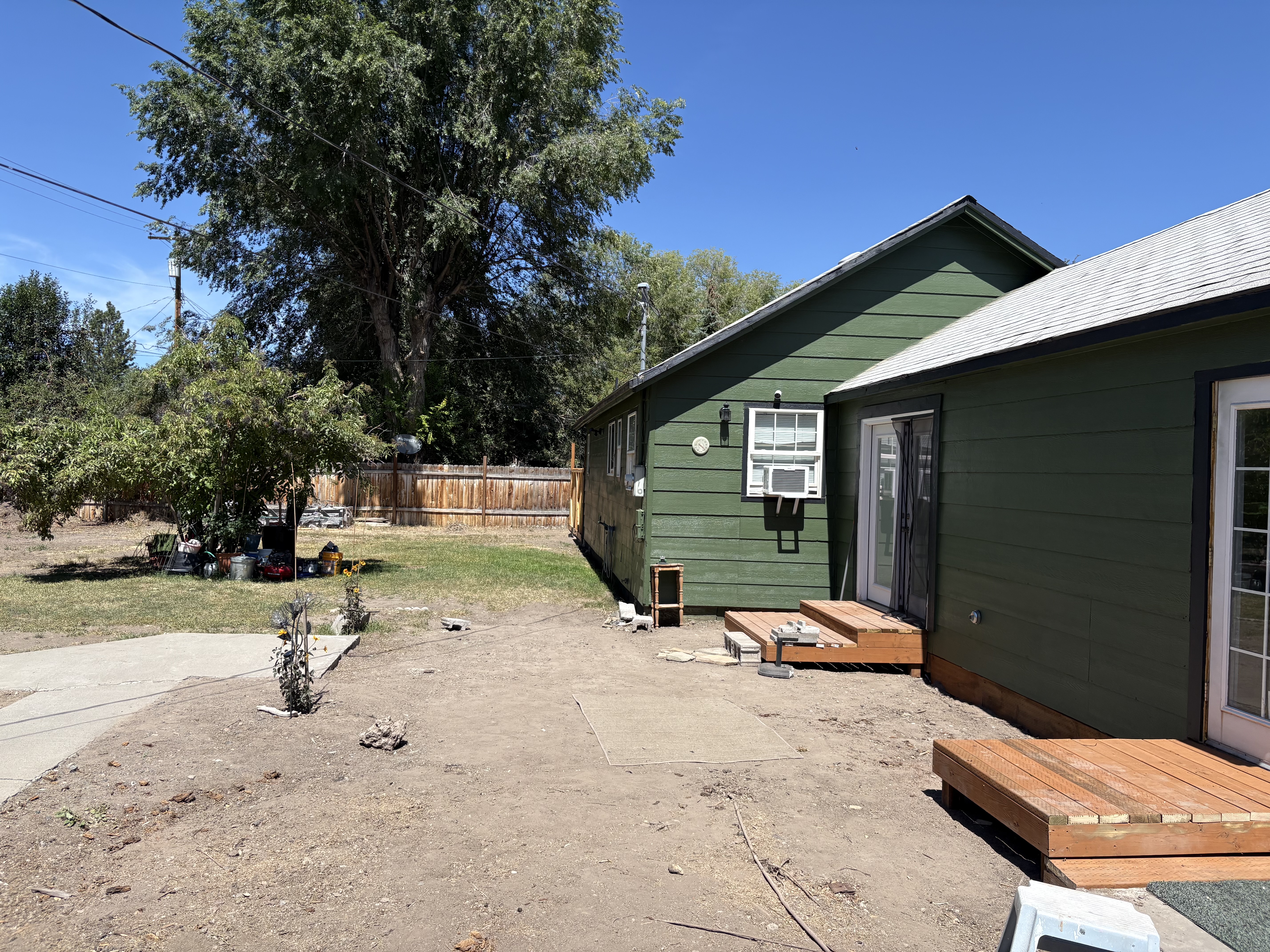 Green house with new cedar landing deck mid-build